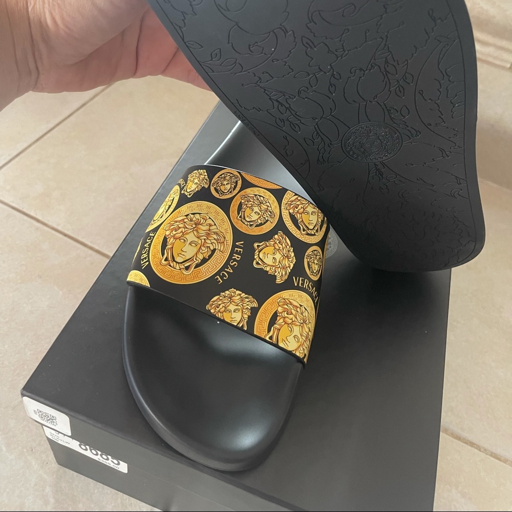 New women’s size 10 Versace slides .black / yellow